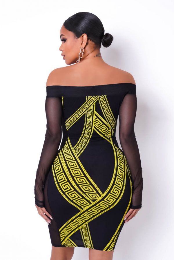 Mirna Mini Dress -Back of the Black with Yellow curved bars crossing over each other.